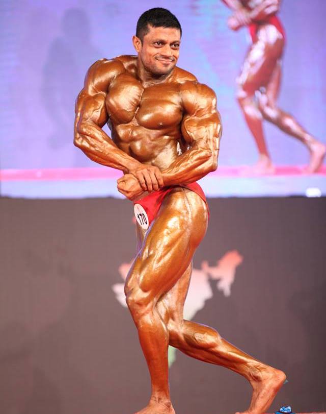 Bodybuilder Performing Side Chest Pose Stock Photo, Picture and Royalty  Free Image. Image 27221303.
