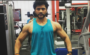 Standing Tall – Aryan at Workout (Source: Facebook)